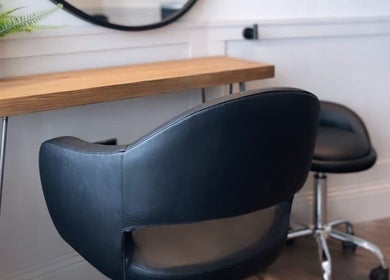 Chic salon chair and desk at Amy at Thirteen in Swalwell, England, GB for a modern beauty experience.