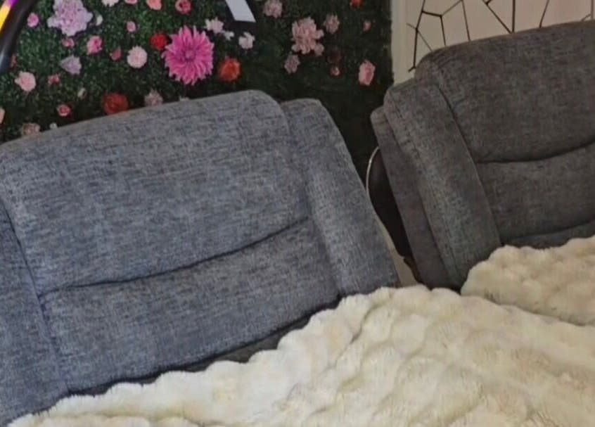 Comfortable gray chairs with fluffy blankets at 2 Playhouse Avenue Cairnlea 3023, Melbourne, Victoria, AU.