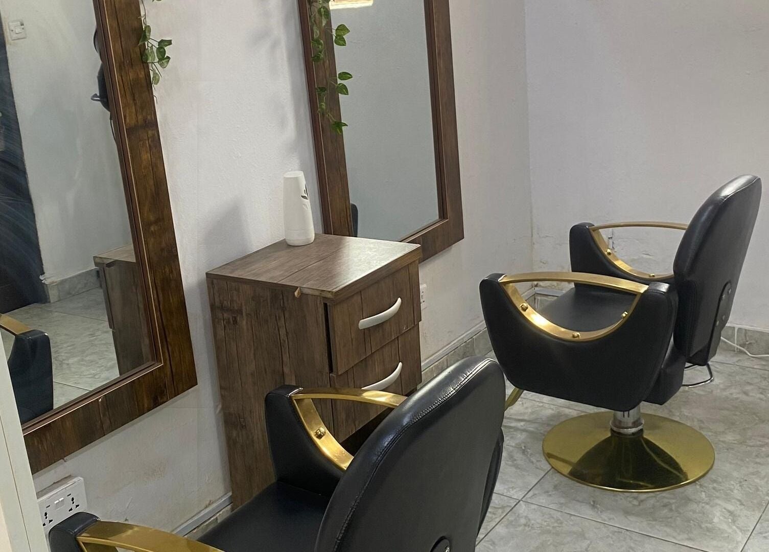Stylish salon chairs and mirrors at Hairloom Salon, Lugbe, Iddo Tudunwada, Federal Capital Territory, NG.