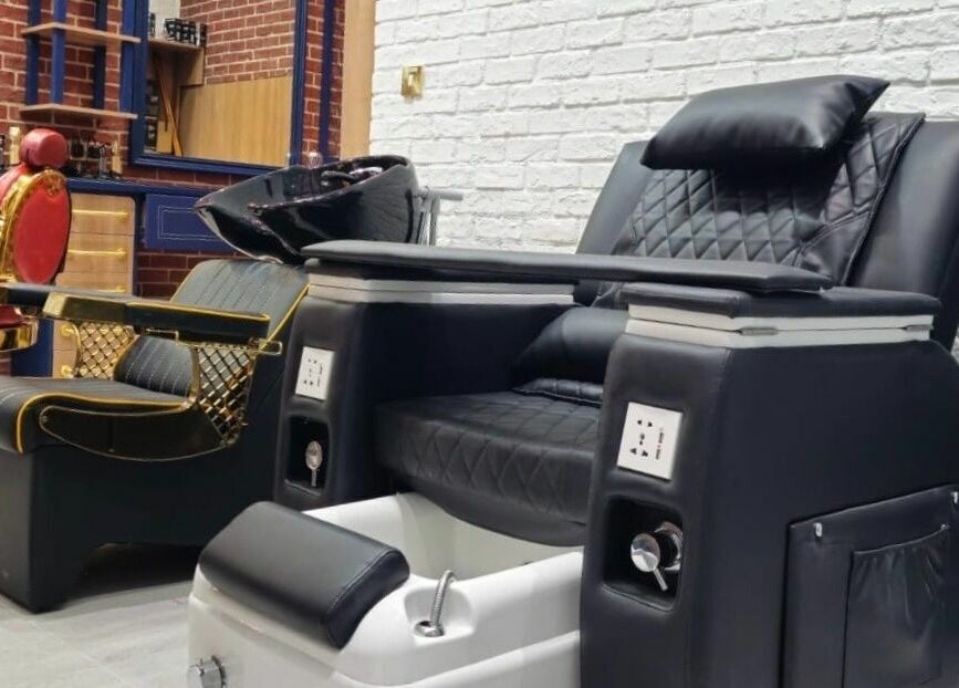 Elegant styling chairs at Doc Barnet - Aljada Solo, Sharjah, Sharjah, AE, showcasing modern salon ambiance.
