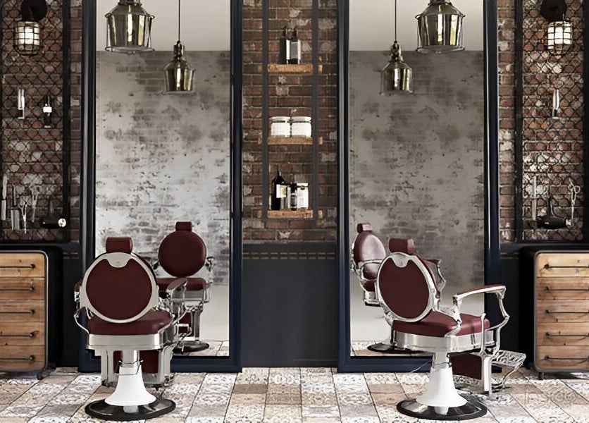 Vintage-themed salon interior at Doc Barnet - Nasma Resident, Sharjah, AE, featuring ornate chairs and mirrors.