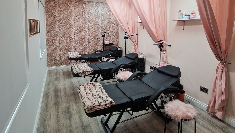 Silk Touch Lashes Glenrothes features a chic, pink-themed lounge with reclining chairs in Glenrothes, Scotland, GB.