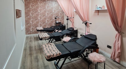 Silk Touch Lashes Glenrothes features a chic, pink-themed lounge with reclining chairs in Glenrothes, Scotland, GB.