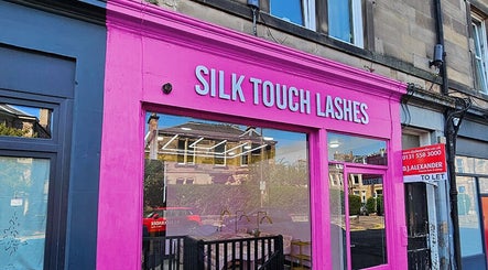 Silk Touch Lashes Edinburgh storefront with bright pink facade in Edinburgh, Scotland, GB.