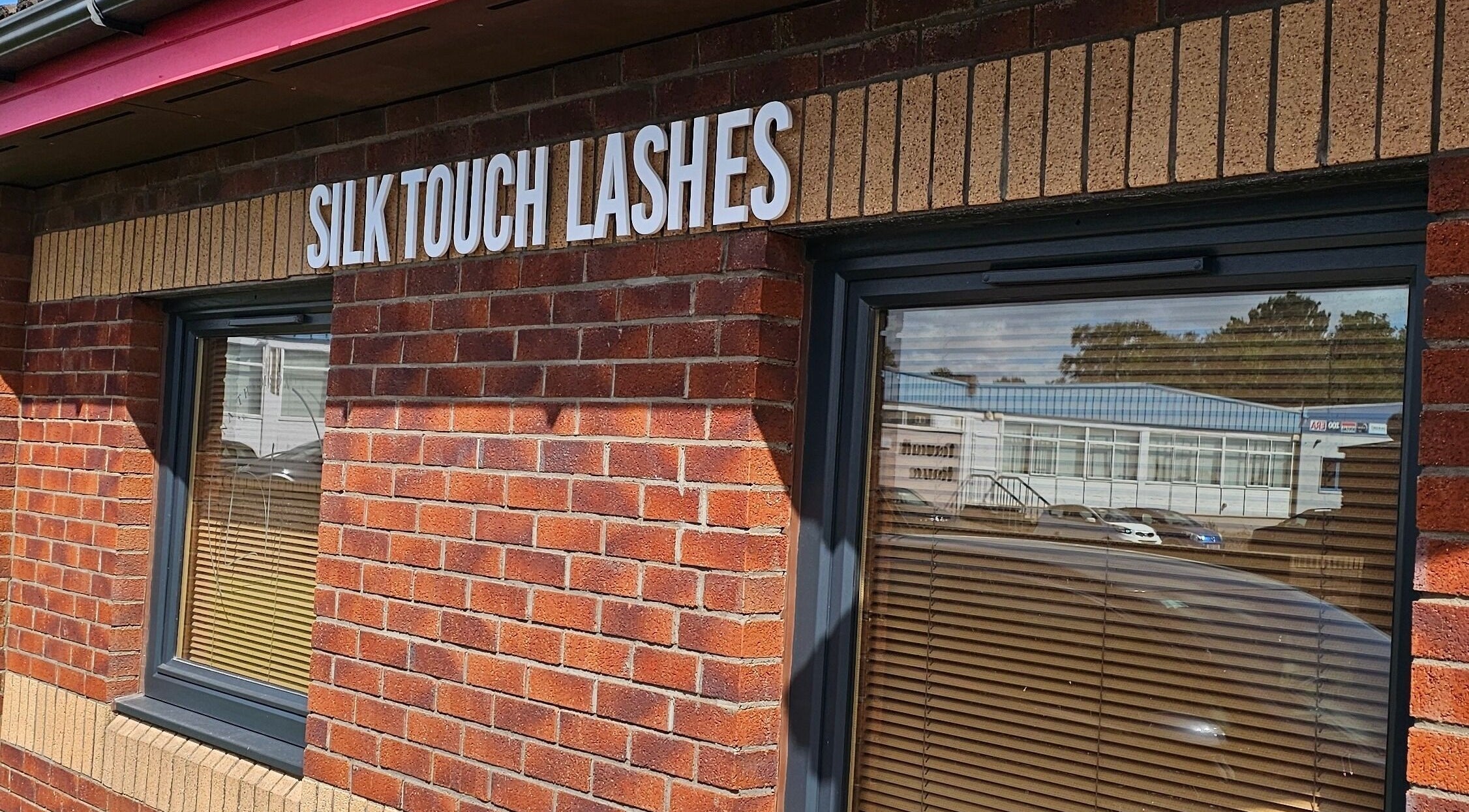 Exterior view of Silk Touch Lashes Glenrothes, featuring a brick facade in Glenrothes, Scotland, GB.