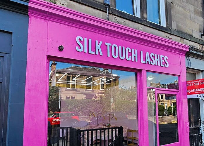 Bright pink exterior of Silk Touch Lashes Edinburgh in Edinburgh, Scotland, GB.