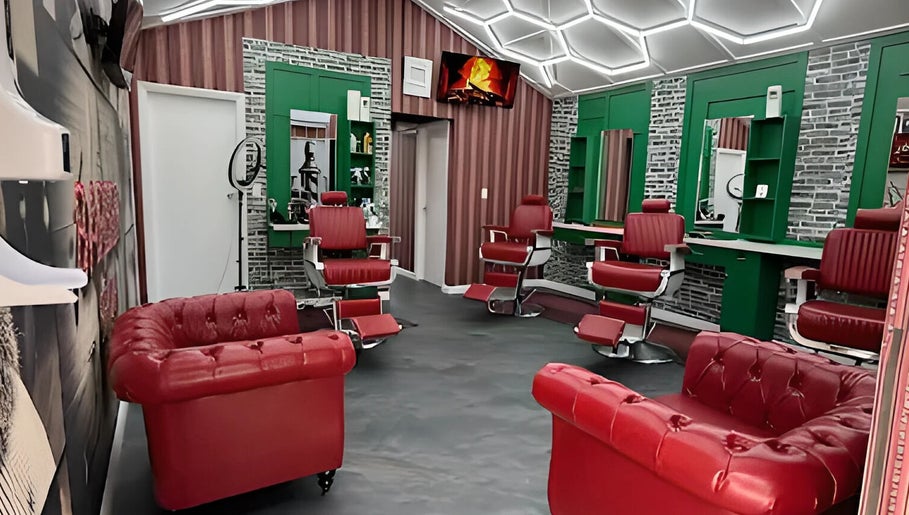 Modern red barber chairs and stylish interior at The Head Office Barber Shop, Nassau, BS.