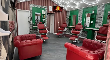 Modern red barber chairs and stylish interior at The Head Office Barber Shop, Nassau, BS.