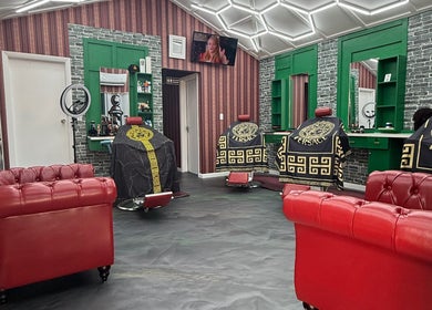 Stylish interior of The Head Office Barber Shop in Nassau, BS showcases luxury barber chairs and decor.