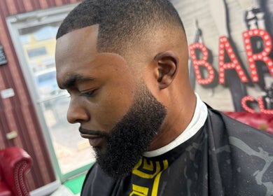 Fresh haircut at The Head Office Barber Shop in Nassau, BS. Sleek look with precision detailing.