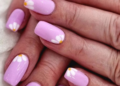 Beautiful lavender nails with daisy design by Nails by Christina, Bridgwater, England, GB.