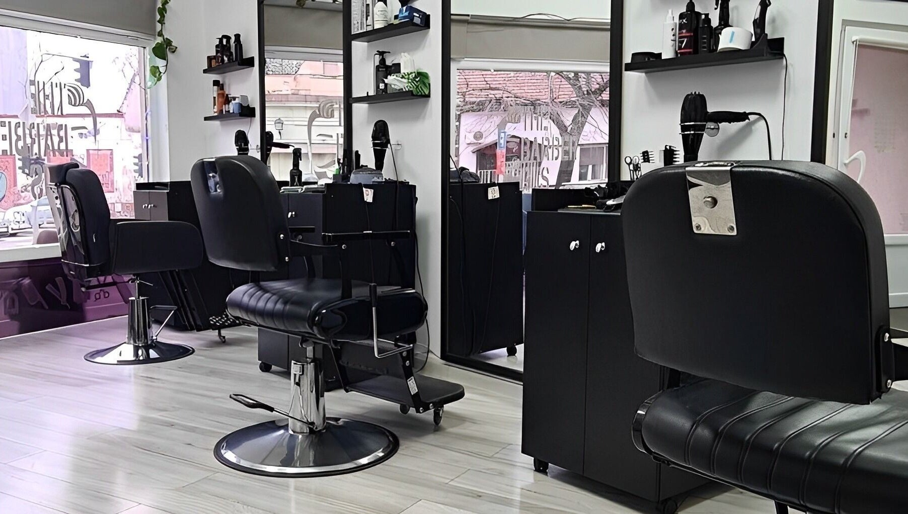 Interior view of The Barber Gus showing stylish chairs and setup in Novi Sad, Vojvodina, RS.
