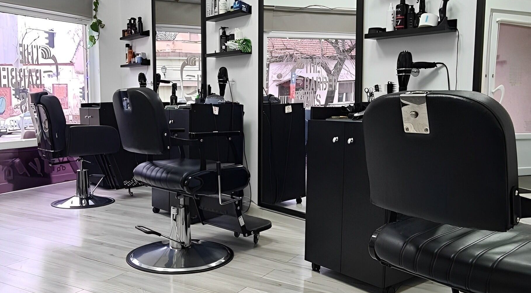 Interior view of The Barber Gus showing stylish chairs and setup in Novi Sad, Vojvodina, RS.