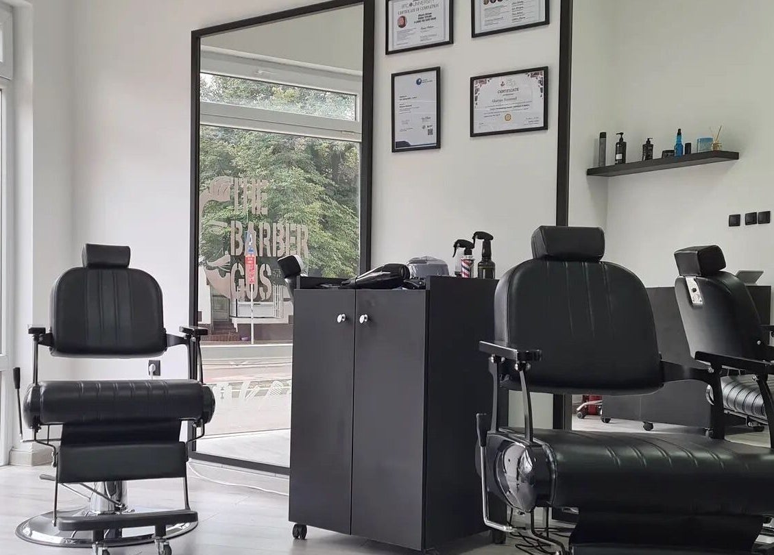 Sleek barber chairs at The Barber Gus, Novi Sad, Vojvodina, RS, showcasing modern interior design.
