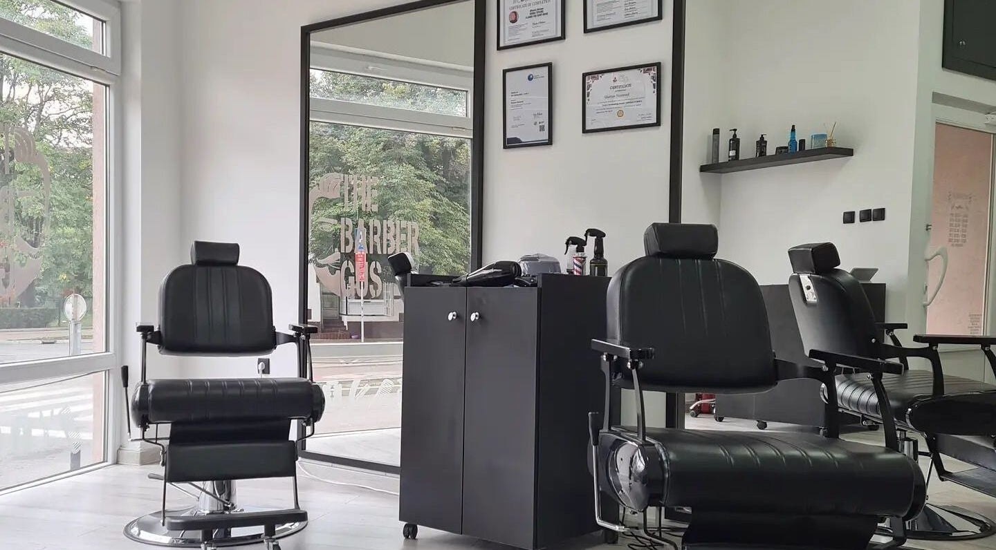 Sleek barber chairs at The Barber Gus, Novi Sad, Vojvodina, RS, showcasing modern interior design.