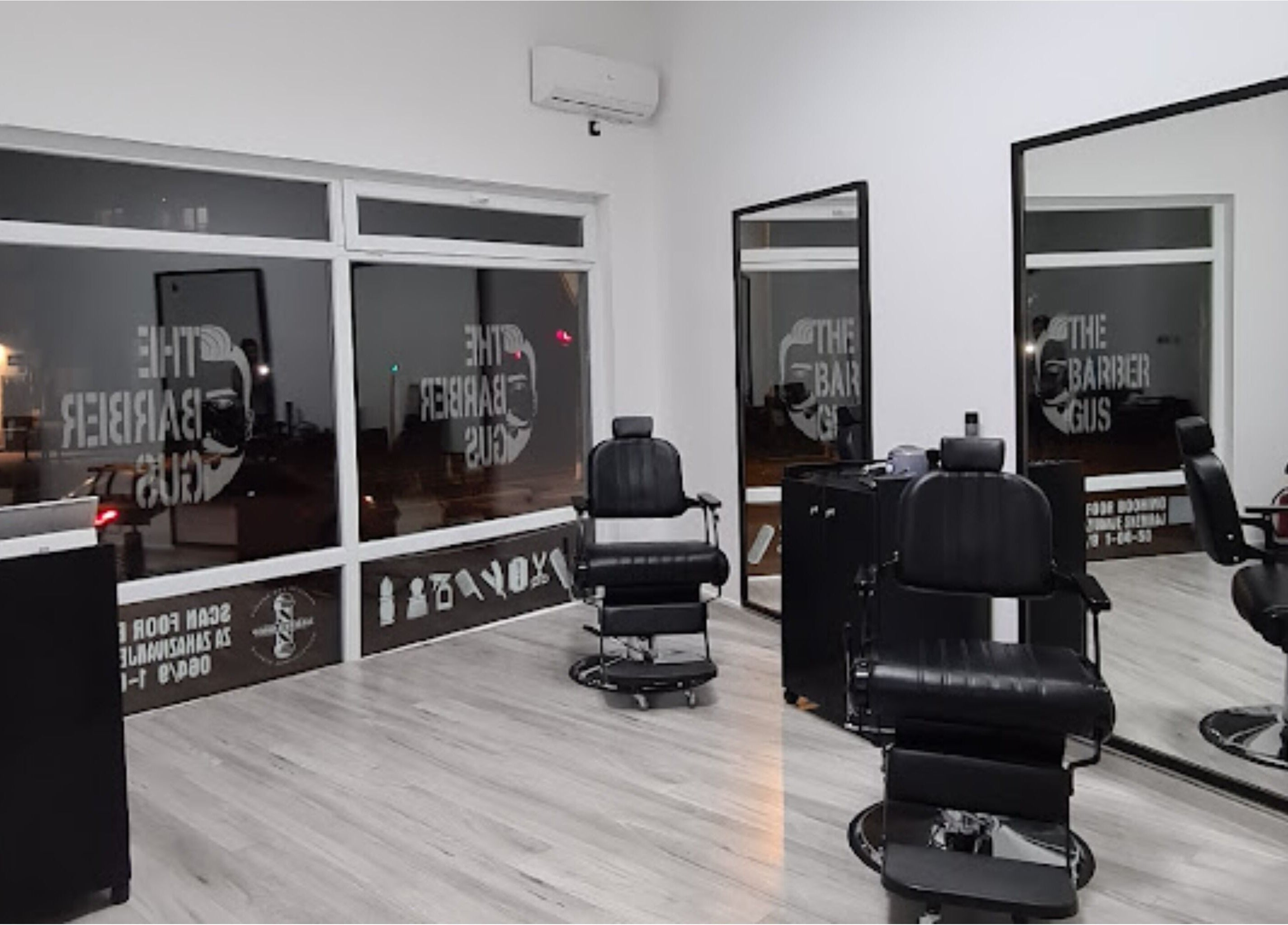Modern barber chair and mirrors inside The Barber Gus, Novi Sad, Vojvodina, RS.