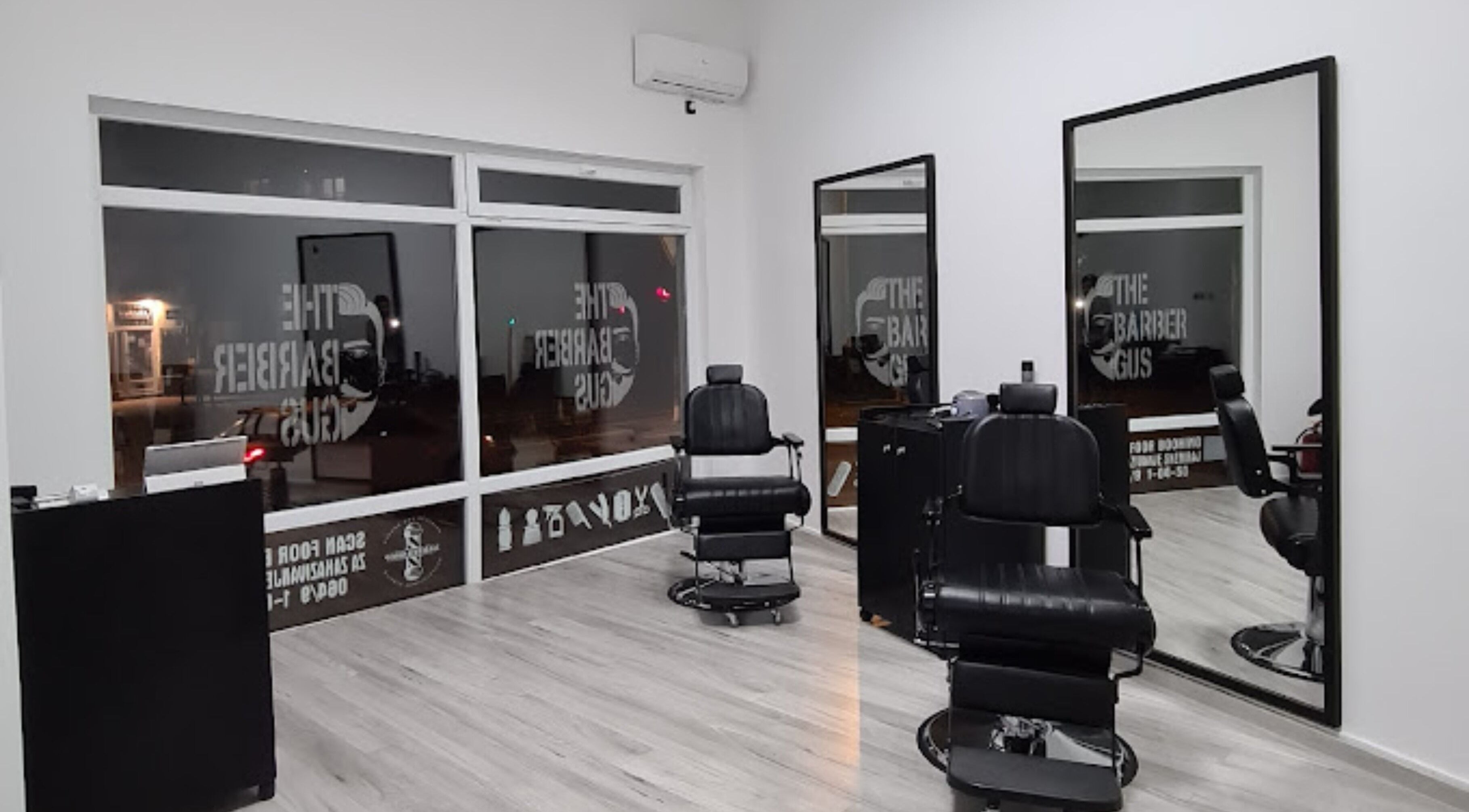 Modern barber chair and mirrors inside The Barber Gus, Novi Sad, Vojvodina, RS.