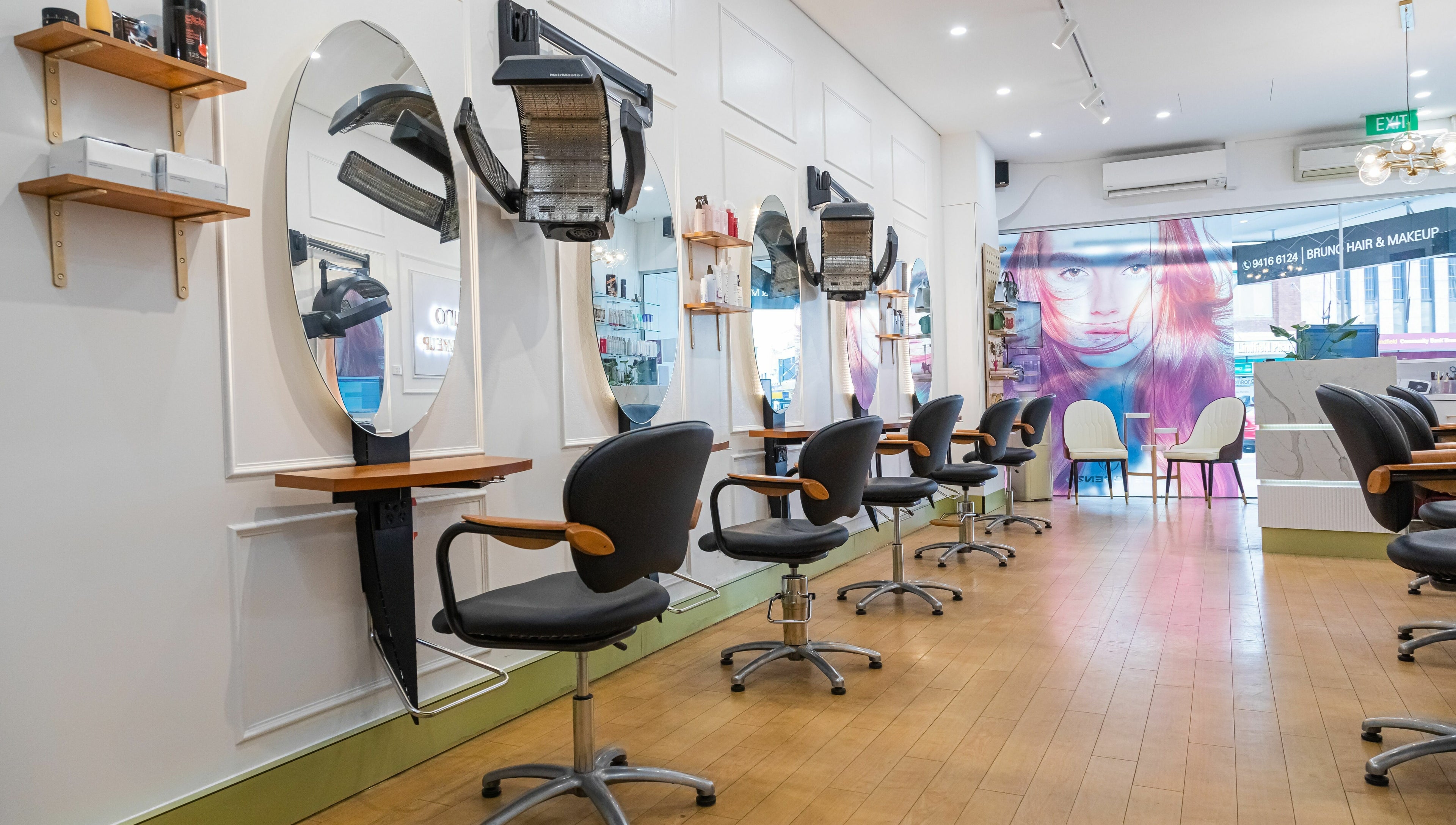Modern salon chairs and mirrors at Bruno Hair and Makeup in Lindfield, New South Wales, AU.