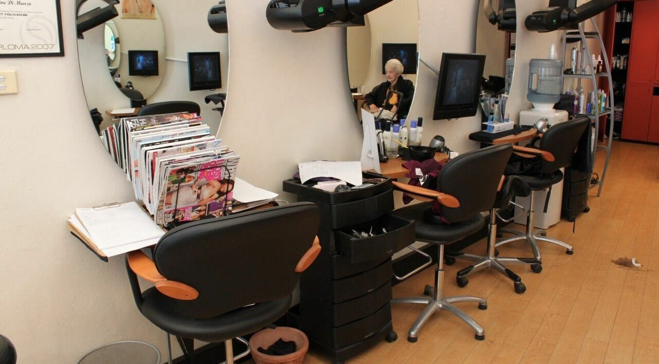Chic interior of Bruno Hair and Makeup, Lindfield, NSW, AU with salon chairs and mirrors.