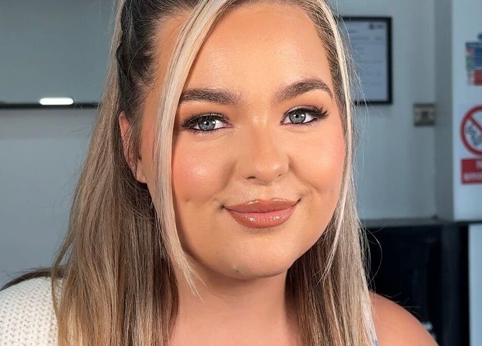 Woman with flawless makeup by EleanorLarkinMUArtistry, Hindley, England, GB.