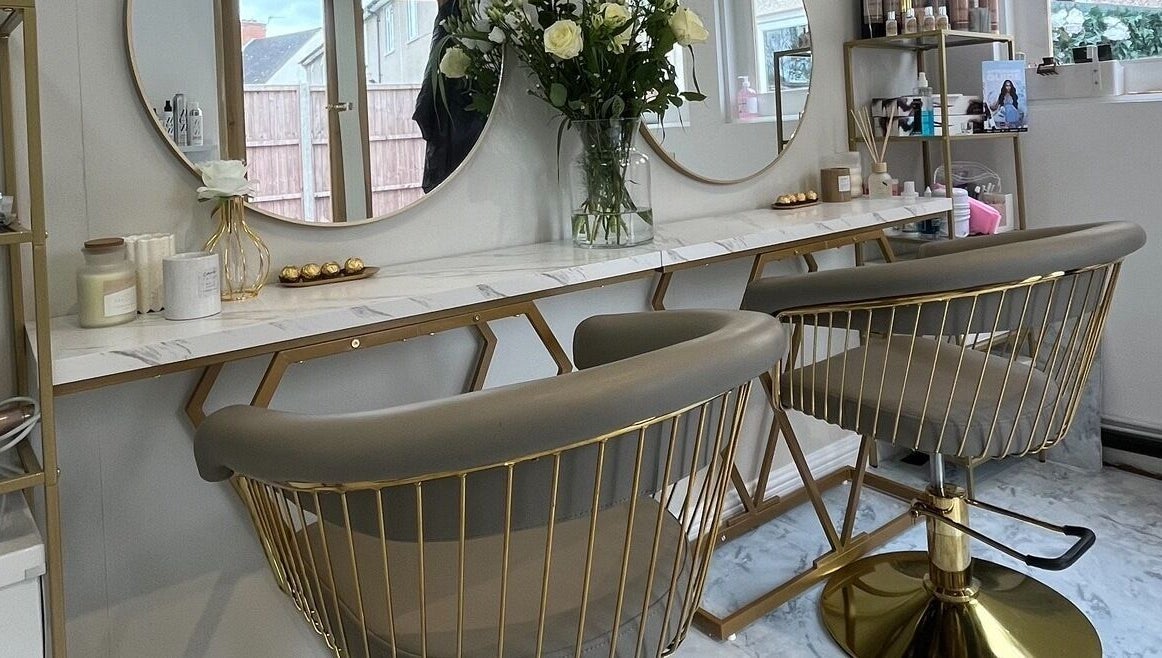 Chic salon chairs and mirrors at Hair by Aimee in Hatfield, England, GB, offering a refined beauty experience.