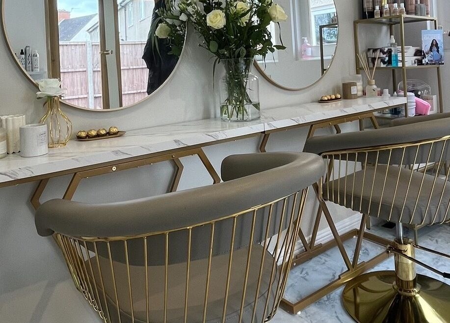 Chic salon chairs and mirrors at Hair by Aimee in Hatfield, England, GB, offering a refined beauty experience.