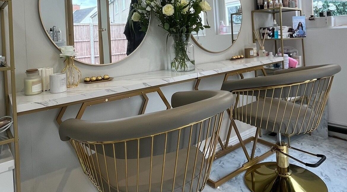Chic salon chairs and mirrors at Hair by Aimee in Hatfield, England, GB, offering a refined beauty experience.