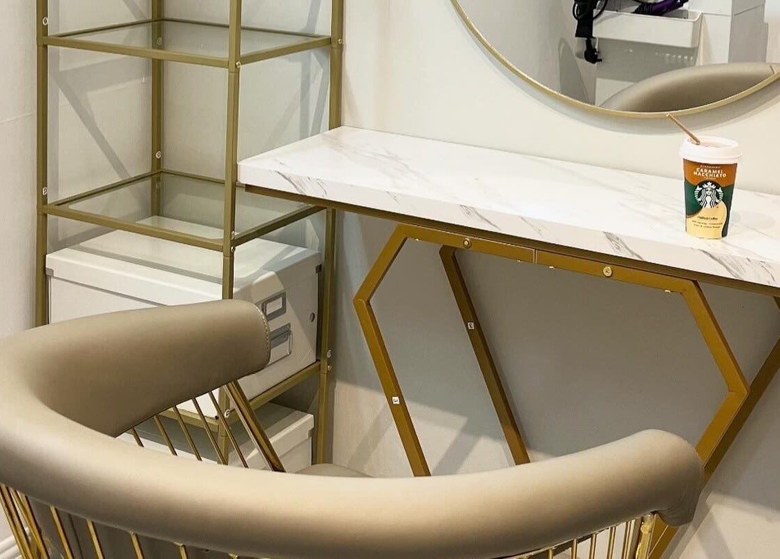 Stylish salon seating at Hair by Aimee, Hatfield, England, GB showcasing modern elegance and comfort.