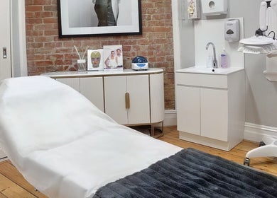 Elegant treatment room at Mayfair Rejuvenation Clinic, Williamstown, Victoria, AU with modern amenities.