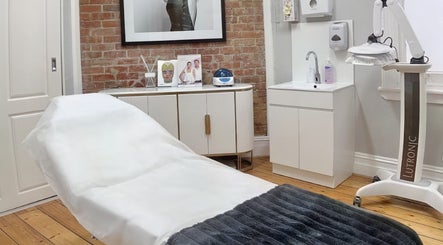 Elegant treatment room at Mayfair Rejuvenation Clinic, Williamstown, Victoria, AU with modern amenities.