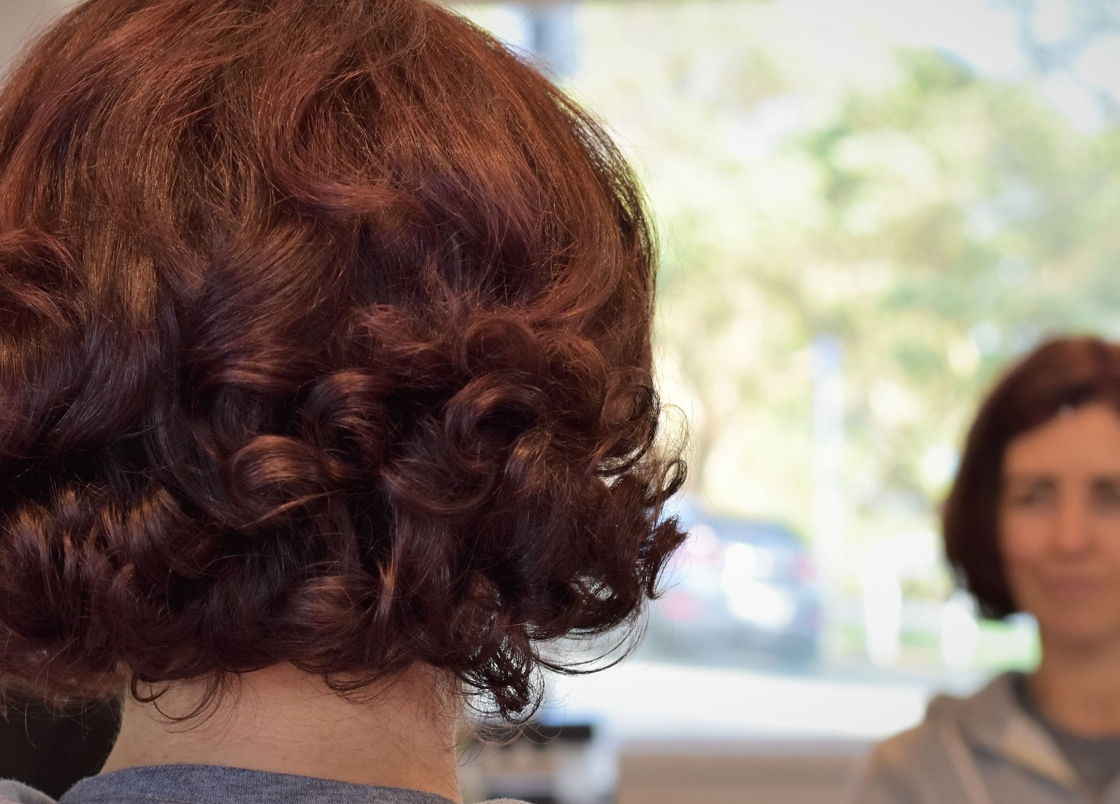 Elegant curled hairstyle at David's Hairstylists, Wellington, Wellington, NZ, enhancing natural beauty.