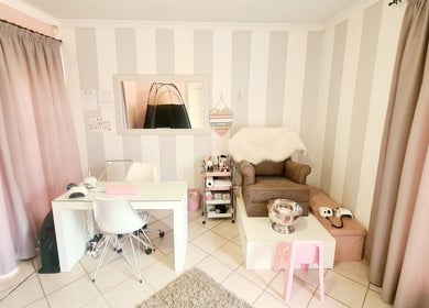 Elegant interior of Titivate Nail & Spray Tan Studio, Somerset West, Western Cape, ZA, showcasing beauty seating.