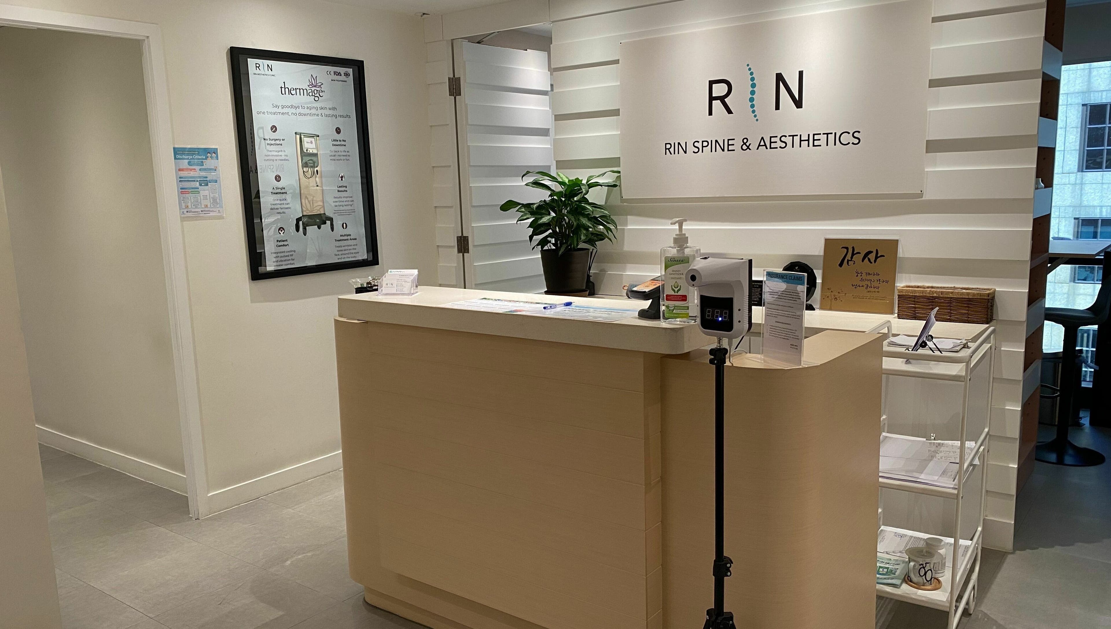 Reception area of Rin Spine Clinic, Hong Kong Island, HK, featuring a modern desk and welcoming ambiance.