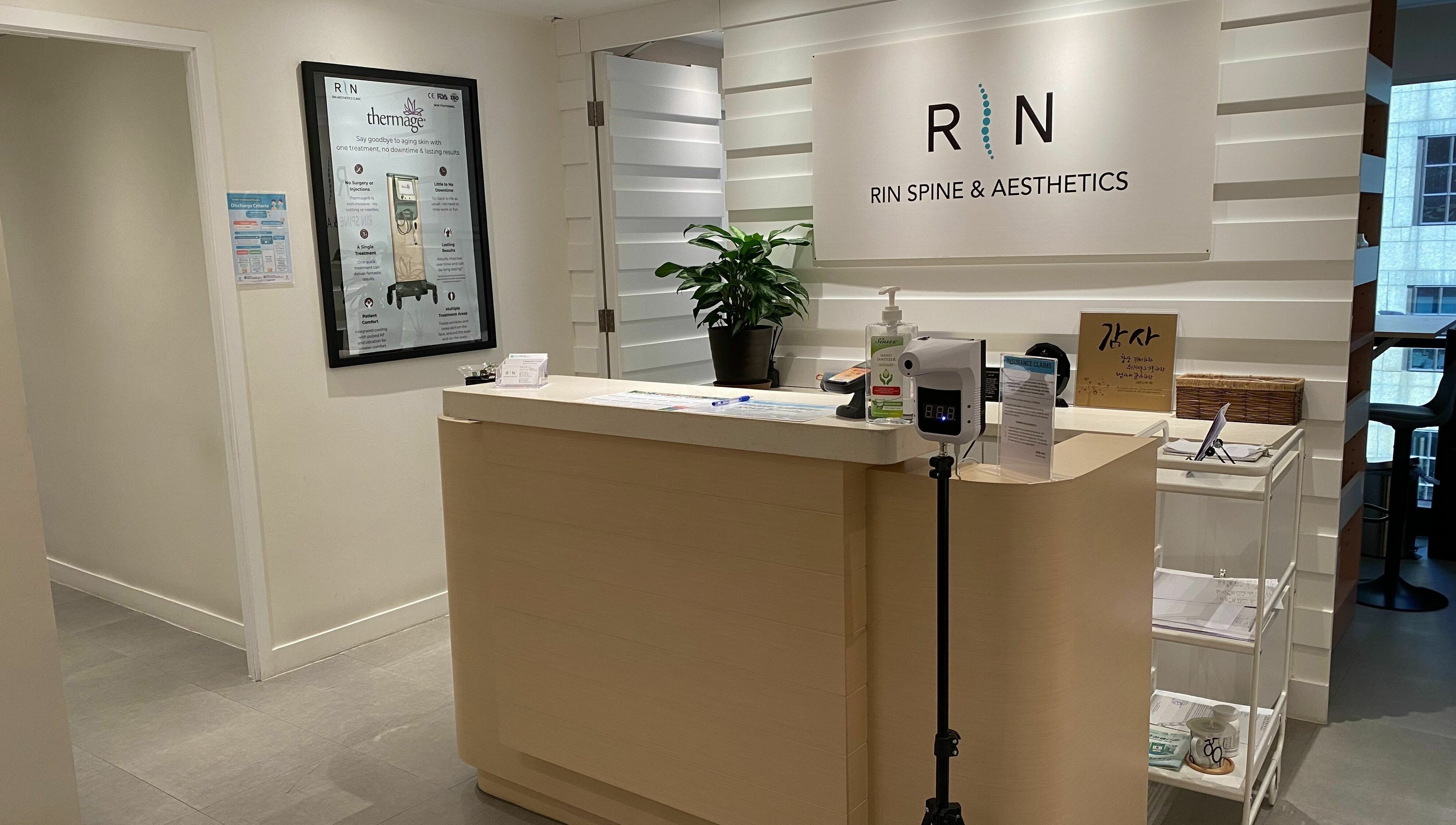 Reception area of Rin Spine Clinic, Hong Kong Island, HK, featuring a modern desk and welcoming ambiance.