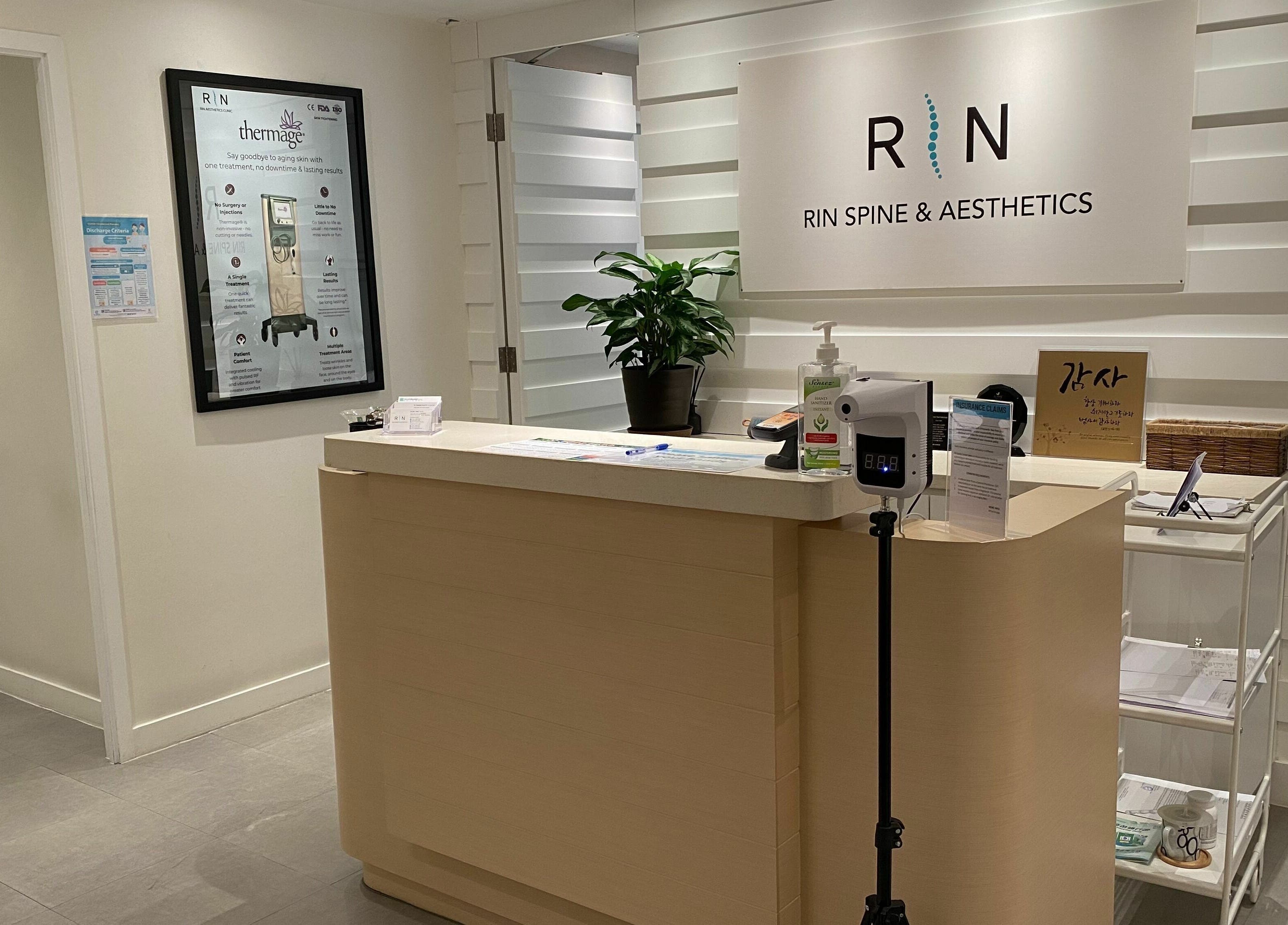 Reception area of Rin Spine Clinic, Hong Kong Island, HK, featuring a modern desk and welcoming ambiance.