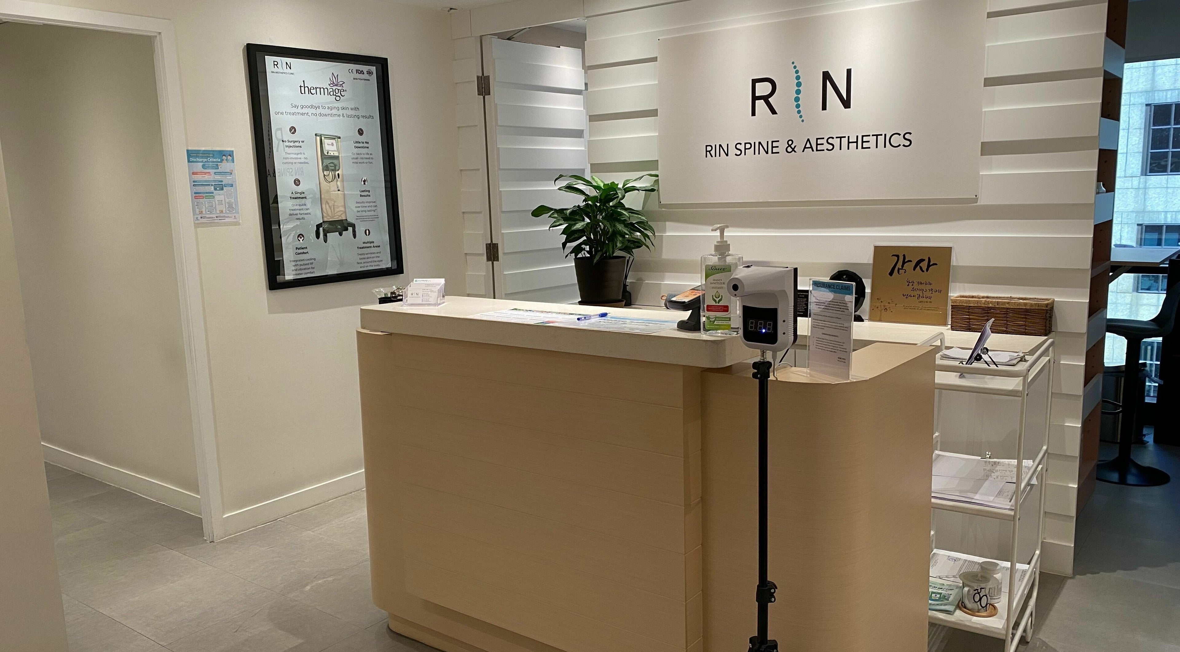 Reception area of Rin Spine Clinic, Hong Kong Island, HK, featuring a modern desk and welcoming ambiance.