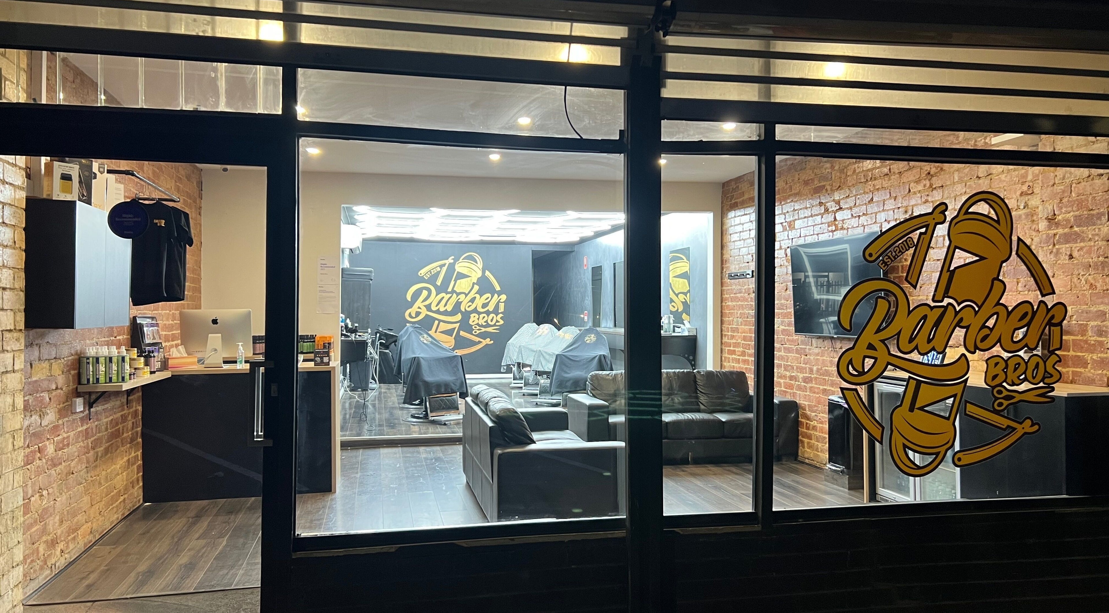 Barber Bros interior view in Melbourne, Victoria, AU, showcasing modern chairs and stylish decor.