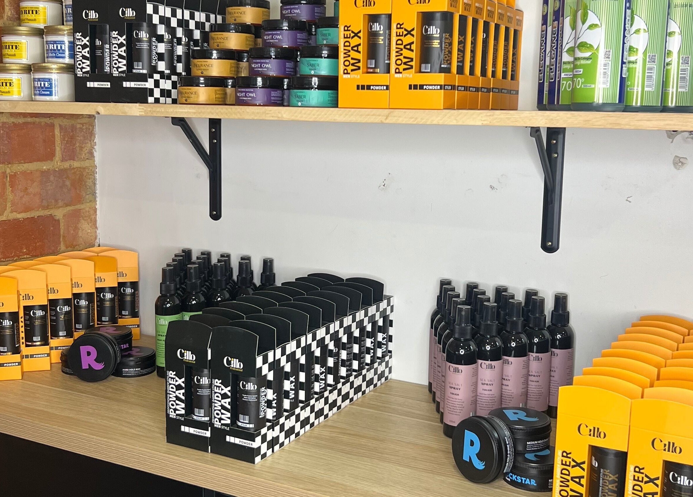 Hair products on shelves at Barber Bros, Melbourne, Victoria, AU, showcasing a variety of grooming essentials.