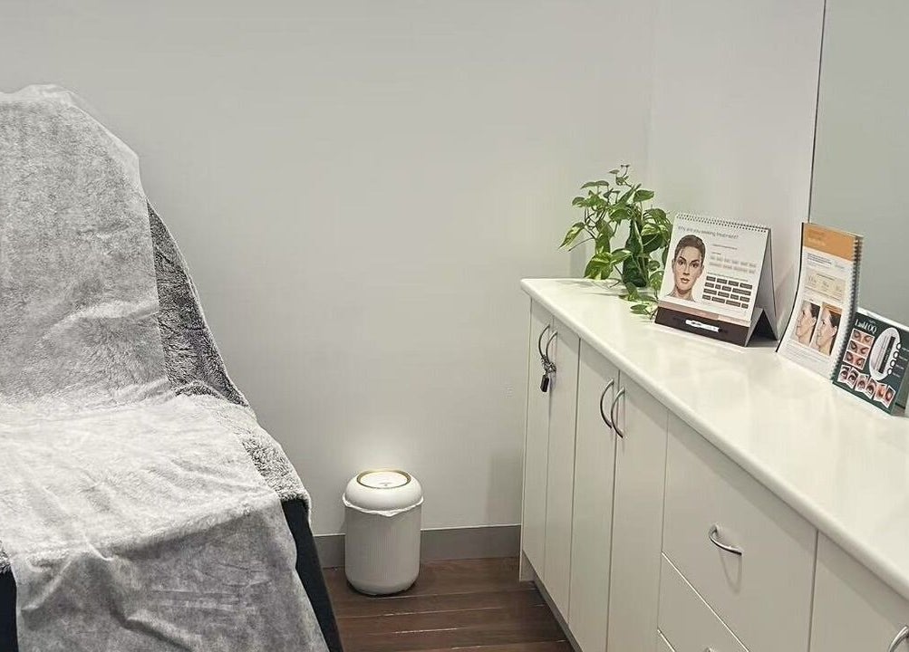 A serene treatment room at MB Luxury Spa Castletown, Hyde Park, Queensland, AU featuring a cozy spa chair and tranquil decor.