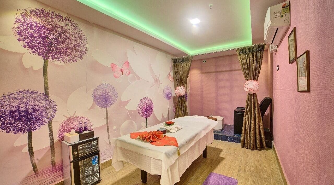 Luxurious massage room at Hasta Spa Tada in Tada, Andhra Pradesh, IN with elegant floral decor.