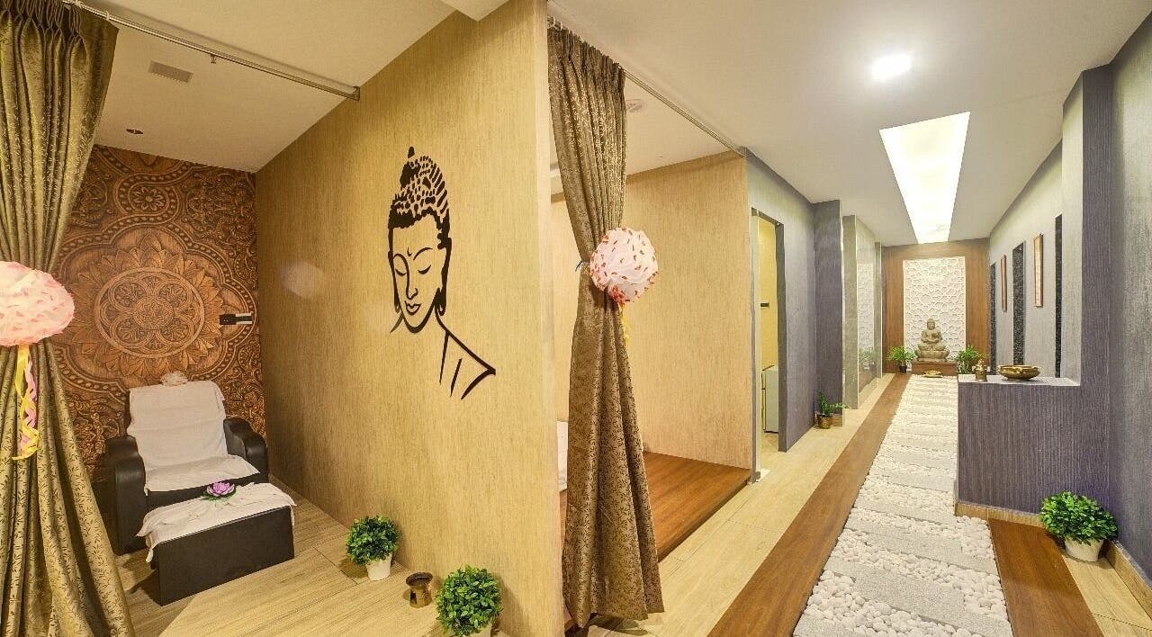 Relaxing interior of Hasta Spa Tada in Tada, Andhra Pradesh, IN with a calming decor and Buddha mural.