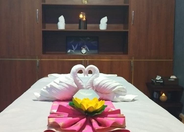 Peaceful massage table setup at Hasta Spa Tada, Tada, Andhra Pradesh, IN with elegantly folded towels.