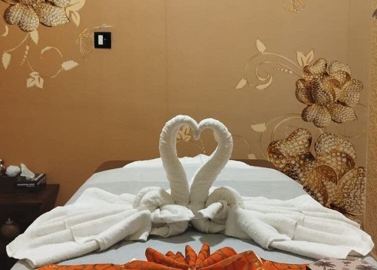 Luxurious spa room at Hasta Spa Tada, Tada, Andhra Pradesh, IN with elegantly folded swan towels.