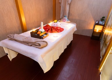 Relaxing massage room at Hasta Spa Besant Nagar, Chennai, Tamil Nadu, IN with ambient lighting and cozy decor.