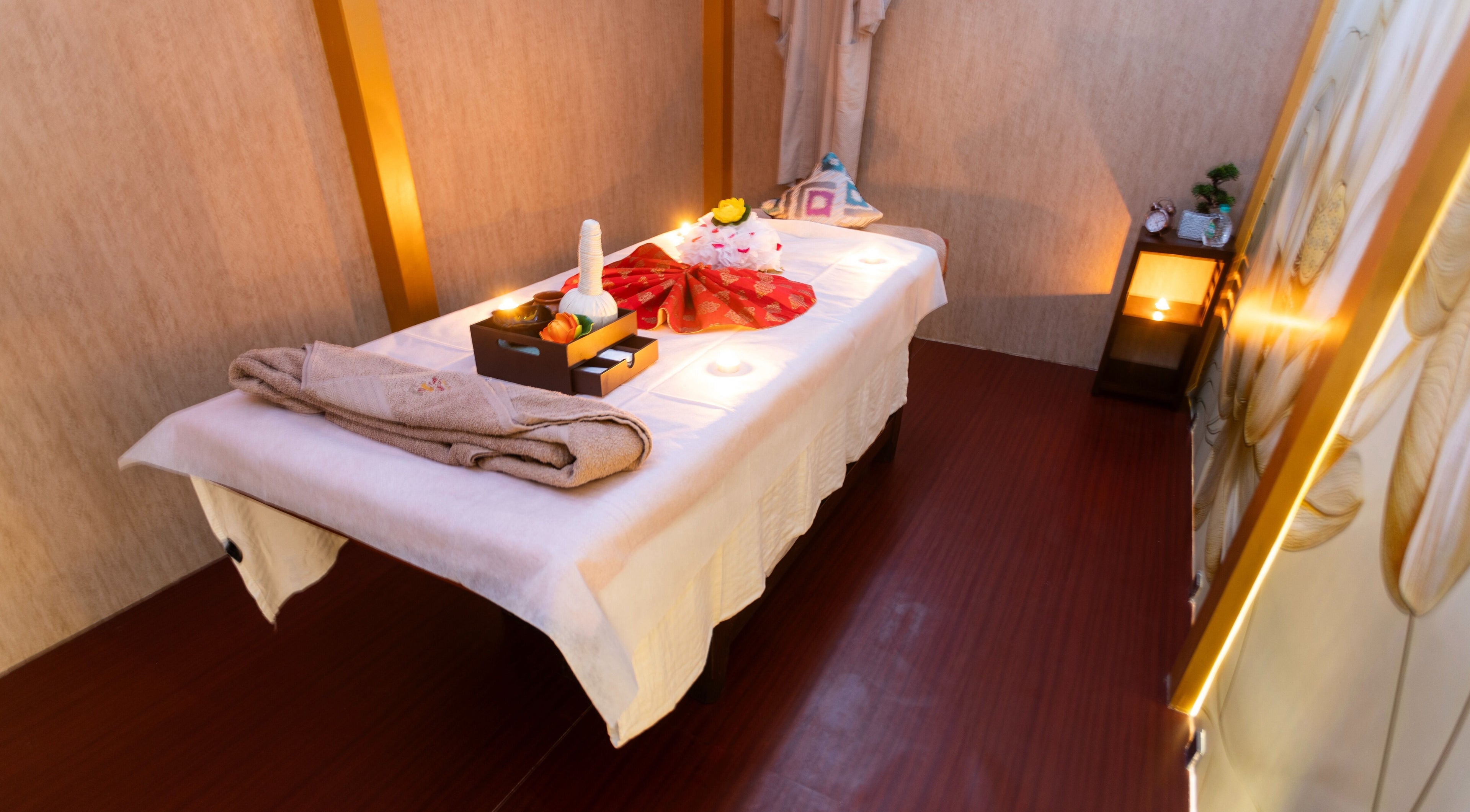 Relaxing massage room at Hasta Spa Besant Nagar, Chennai, Tamil Nadu, IN with ambient lighting and cozy decor.