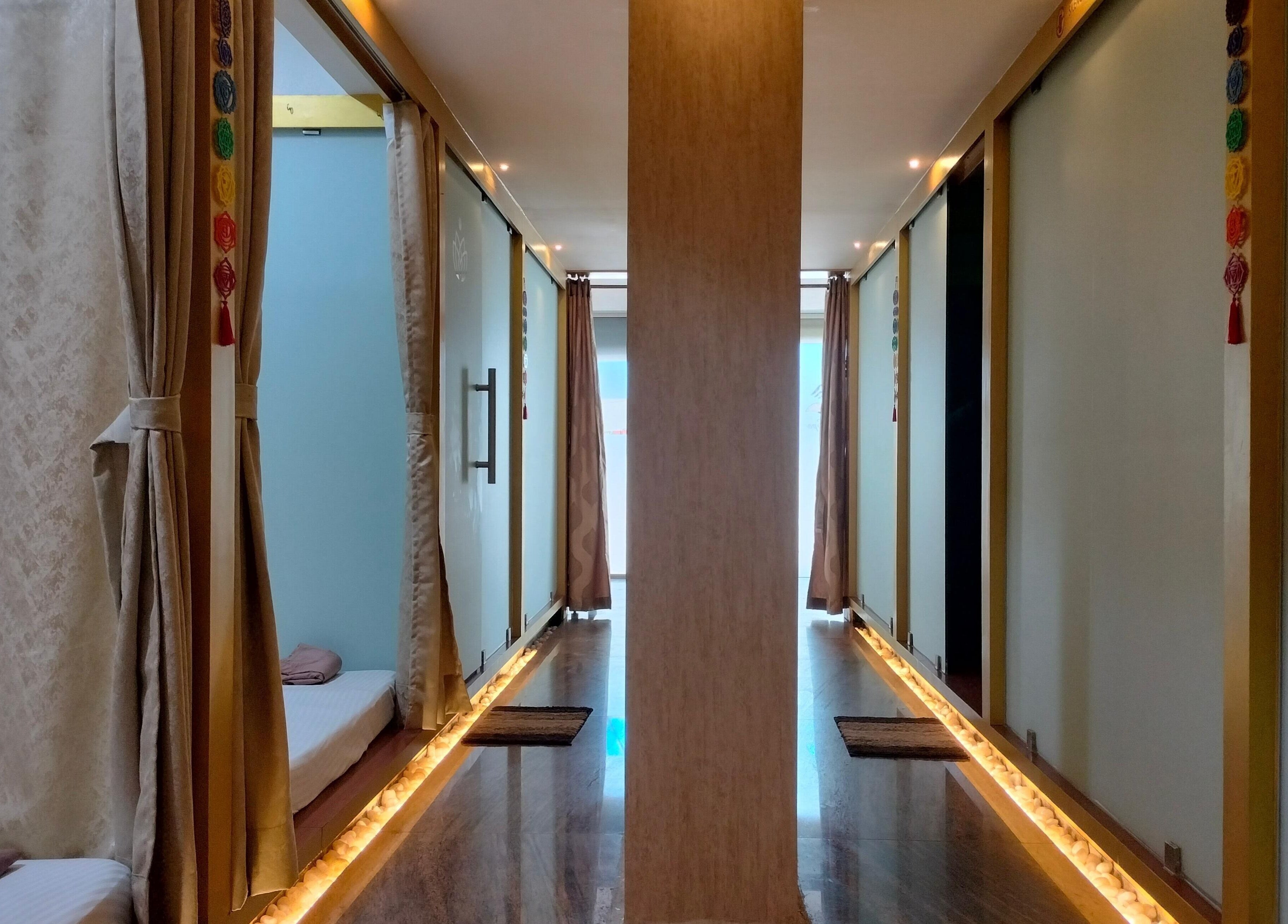 Serene spa hallway at Hasta Spa Besant Nagar, Chennai, Tamil Nadu, IN, offering a tranquil ambiance.