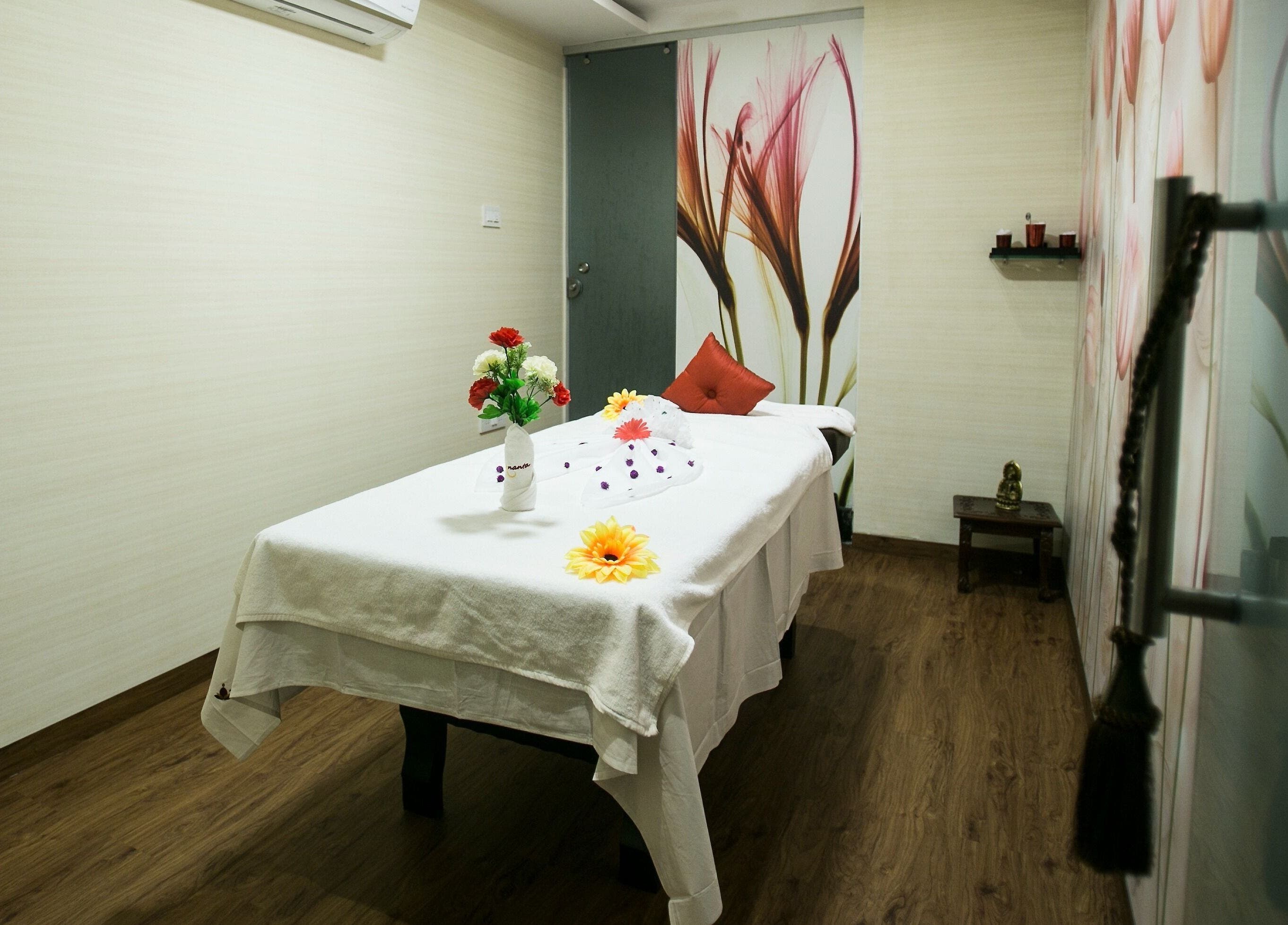 Luxury massage room at Hasta Spa Virugambakkam, Chennai, Tamil Nadu, IN, with elegant decor and cozy ambiance.