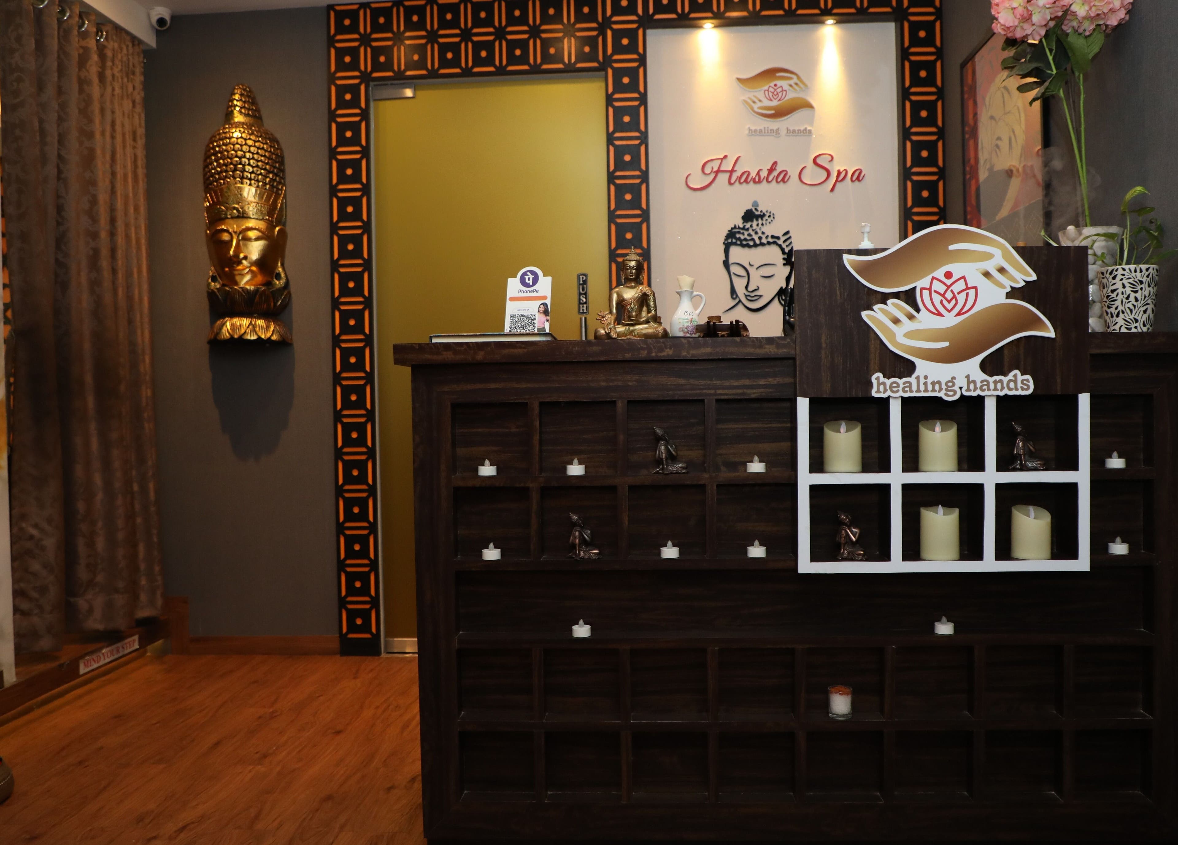 Hasta Spa Virugambakkam's elegant reception area with Buddha statue in Chennai, Tamil Nadu, IN.