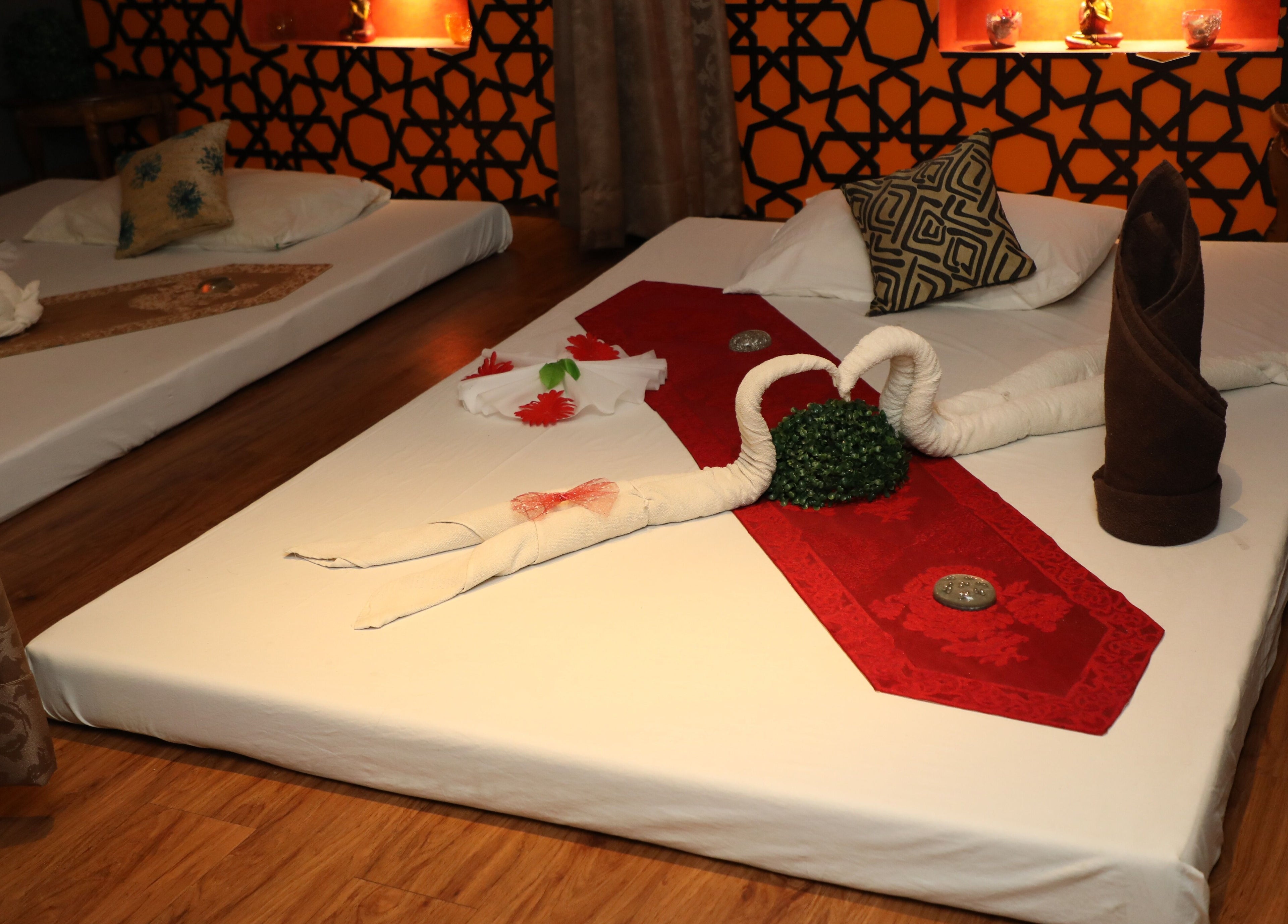 Luxurious spa room at Hasta Spa Virugambakkam, Chennai, Tamil Nadu, IN with elegant decor and cozy ambiance.