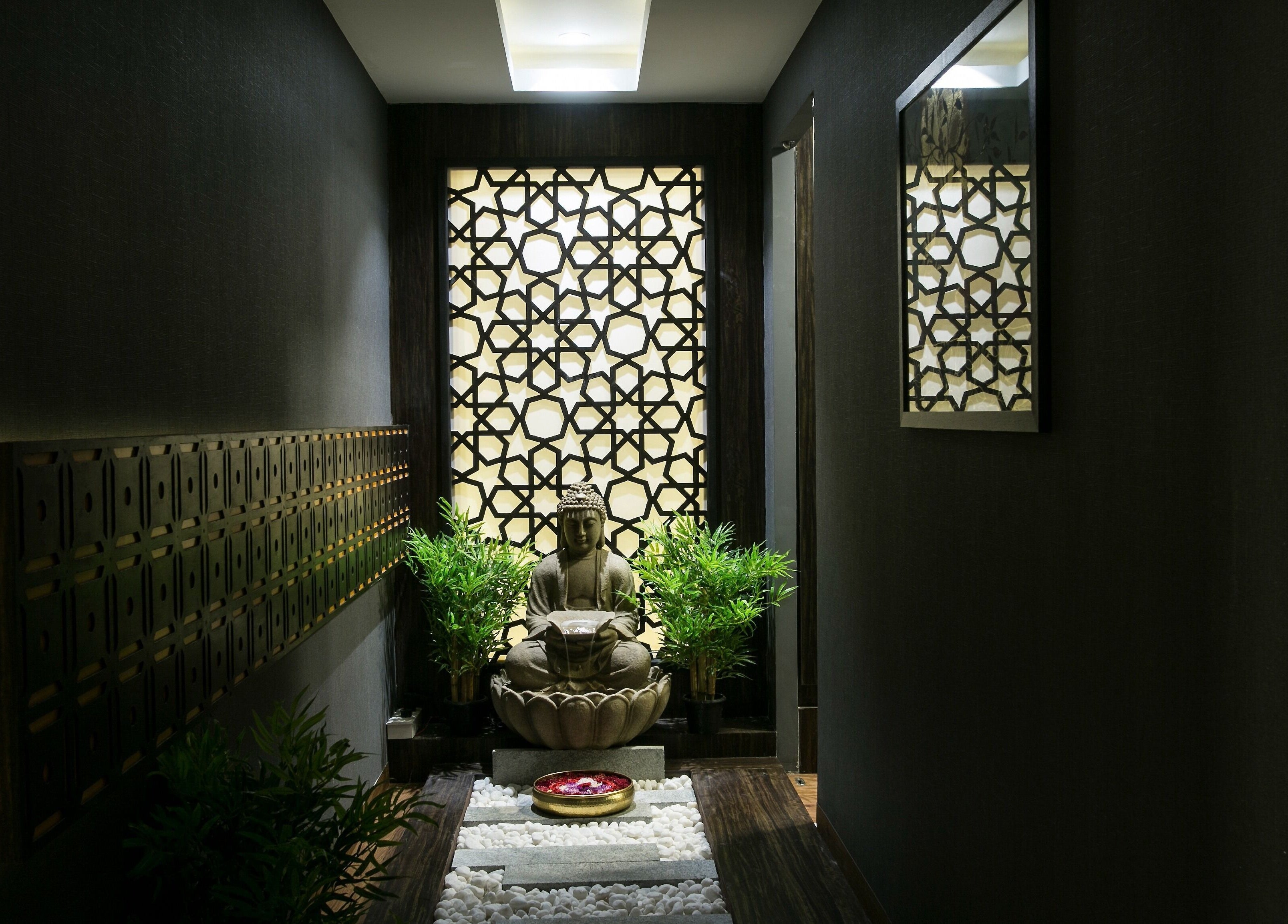 Tranquil Buddha statue at Hasta Spa Virugambakkam, Chennai, Tamil Nadu, IN, enhancing a relaxing atmosphere.